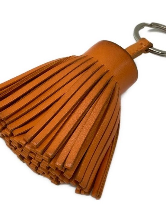 NEW HERMES ORANGE SHOPPING SAC KEYCHAIN BAG CHARM CARMEN  HERMES Carmen - Orange Agneau Milo Bag Charm